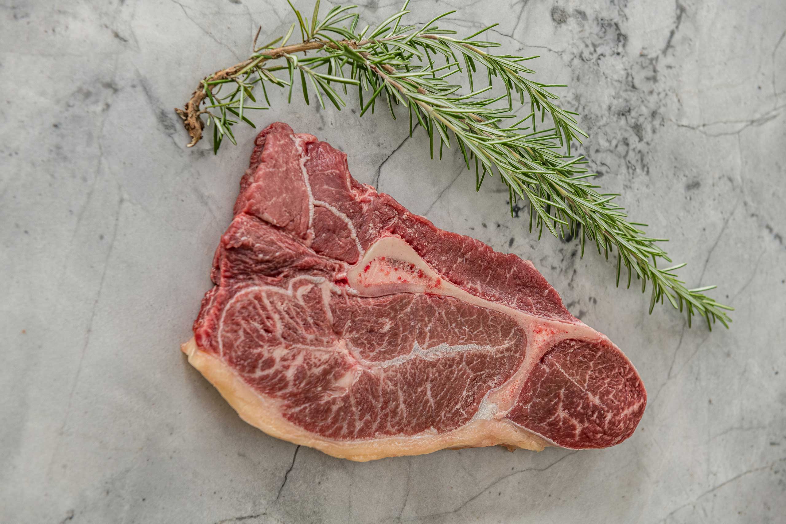 Pan-Seared Cross Cut Blade Steaks with Garlic & Rosemary Compound Butter